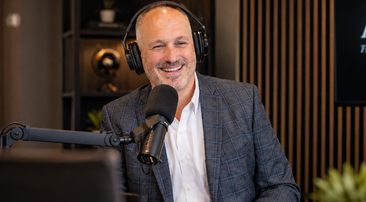 Podcast host recording with studio microphone